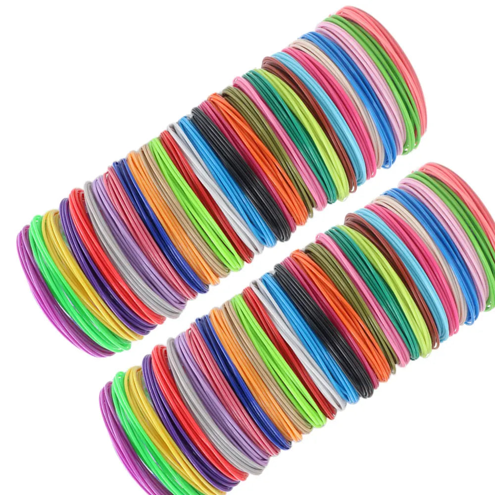A coil of multi-color PLA filament for 3D pens, featuring various shades of green, pink, blue, and orange.