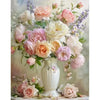 A bouquet of pink and cream roses and lavender flowers used as a background for a diamond painting kit.