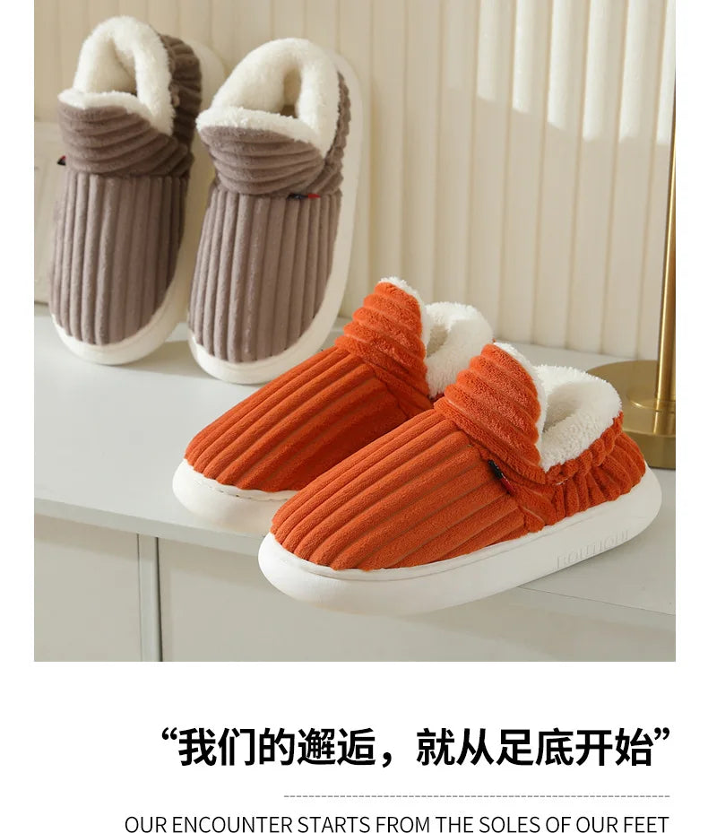 A pair of women's cozy slippers in shades of brown and orange with faux fur lining