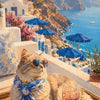 A fluffy tabby cat wearing a blue patterned scarf sits on a wooden tray overlooking a coastal view.
