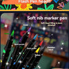 A collection of dual brush tip art markers in various colors including violet, blue, red, and green, showing a close-up of th