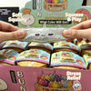 Hands hold a glitter unicorn bun squishy toy for stress relief and sensory play.