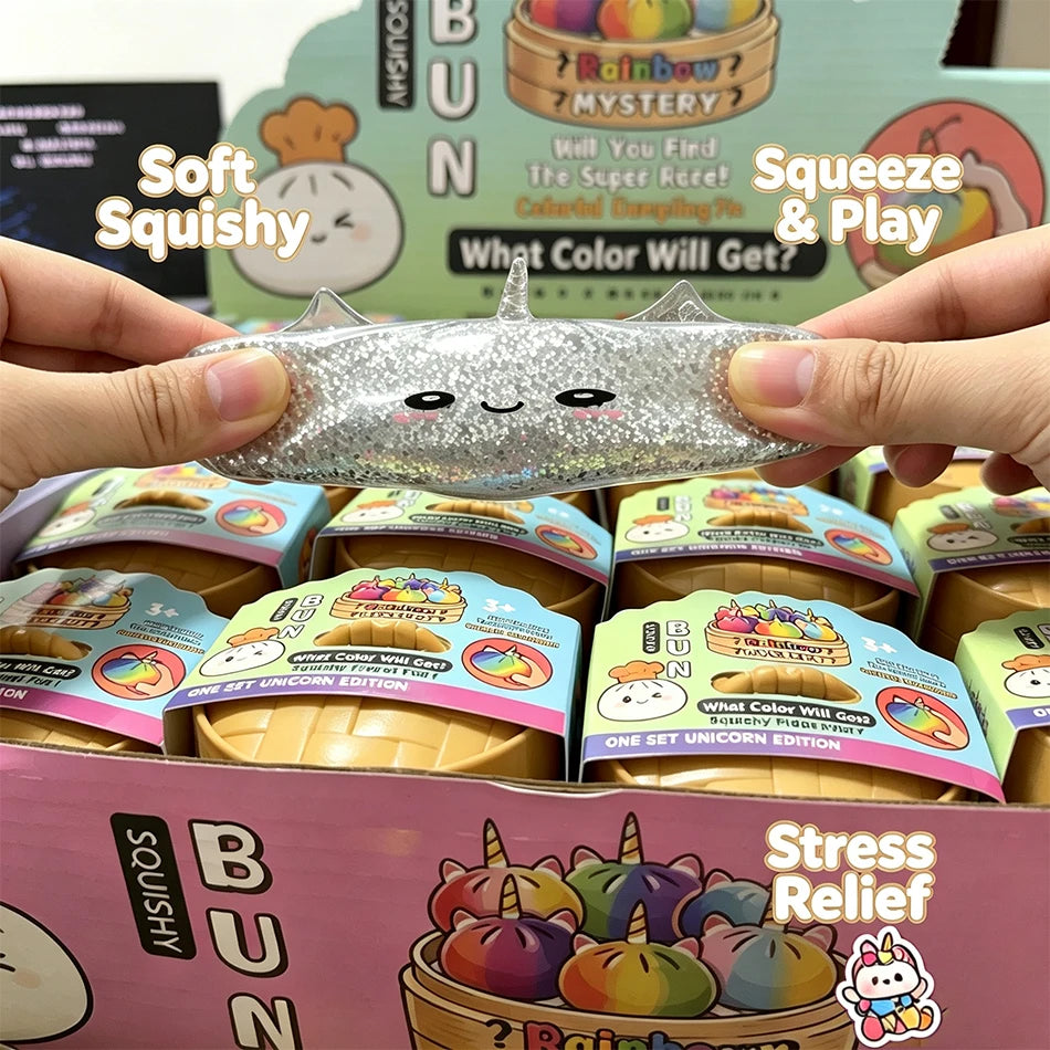 Hands hold a glitter unicorn bun squishy toy for stress relief and sensory play.