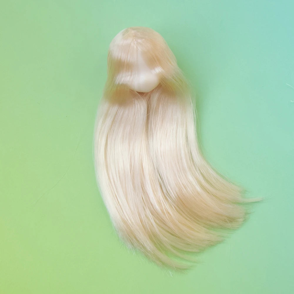 A long, blonde, straight hair wig displayed against a light green background.