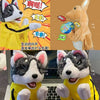 A plush toy of a dog character in yellow and black attire, shown in a close-up view.