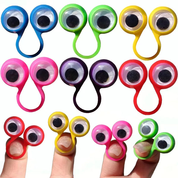Eine Sammlung von bunten Wackelaugen-Fingerringen als sensorische Fidget-Spielzeuge