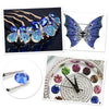 Blue and iridescent resin rhinestone butterfly jewelry and a watch face with sparkling crystals