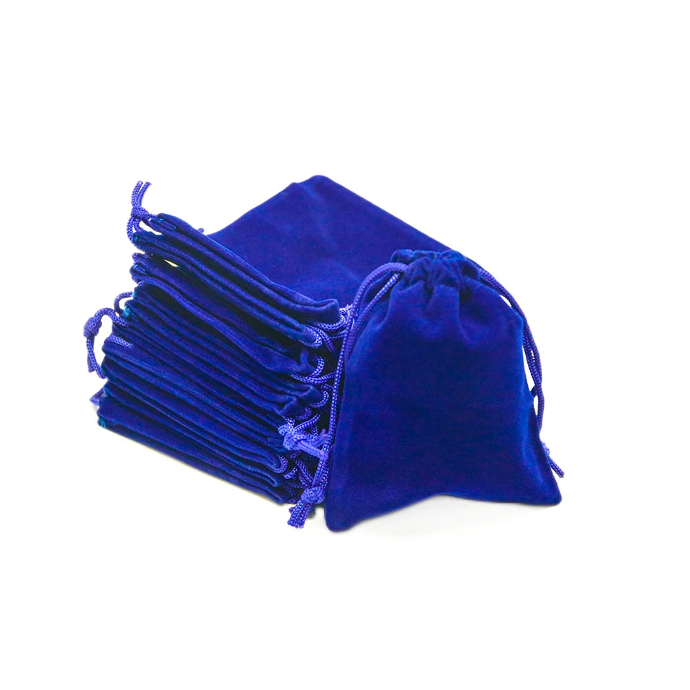 A royal blue compact drawstring dice bag with gathered fabric and visible drawstrings.