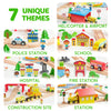 A wooden train set featuring seven unique themes including a police station, school, hospital, fire station, construction sit