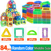 A collection of colorful magnetic building blocks and geometric shapes in various sizes and colors for STEM learning.