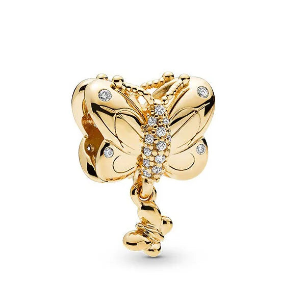 Gold charm bracelet featuring elephant, key, butterfly, and heart pendants