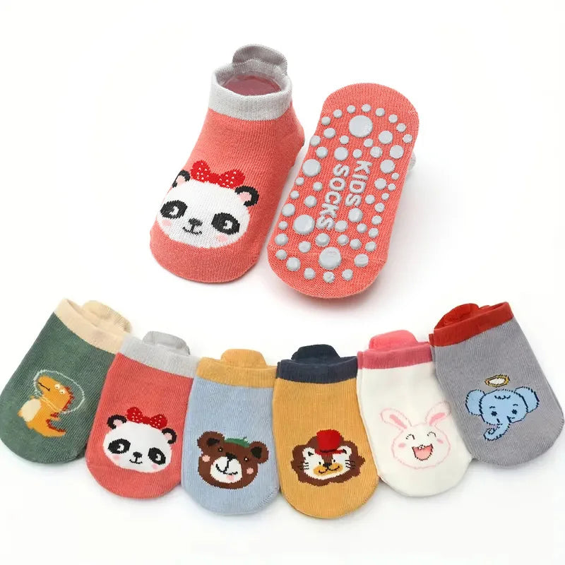 A pack of six pink and gray cotton cartoon animal socks with non-slip grips.