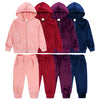 A set of kids' velvet tracksuit featuring a hooded zipper coat and matching pants in various shades of pink, red, purple, and