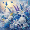 A detailed diamond art image featuring blue and white floral and bird motifs with sparkling accents.