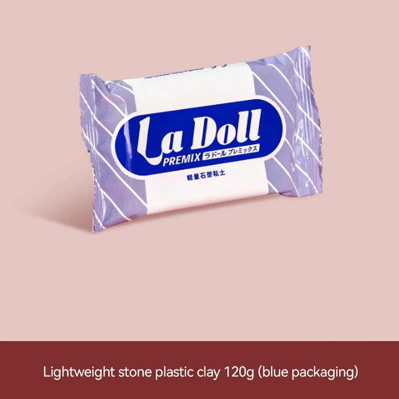 A package of lightweight stone plastic clay in blue packaging labeled La Doll Premix