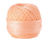 A ball of light peach colored 100% cotton crochet thread for tatting and embroidery.