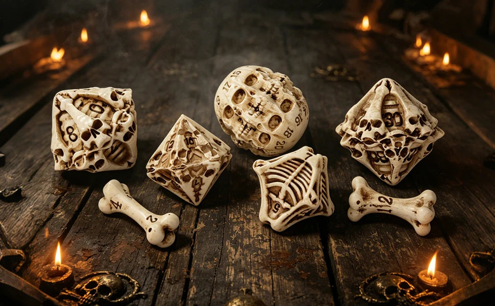 A set of bone and skull carved polyhedral dice resting on a dark wooden surface surrounded by lit candles.