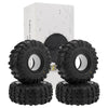 A set of black Super Bouncer 1.9 crawler tires for a 1/10 RC rock crawler, displayed next to its packaging box.