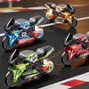 A collection of five die-cast motorcycle keychains in various colors and finishes performing an inertia action on a dark surf
