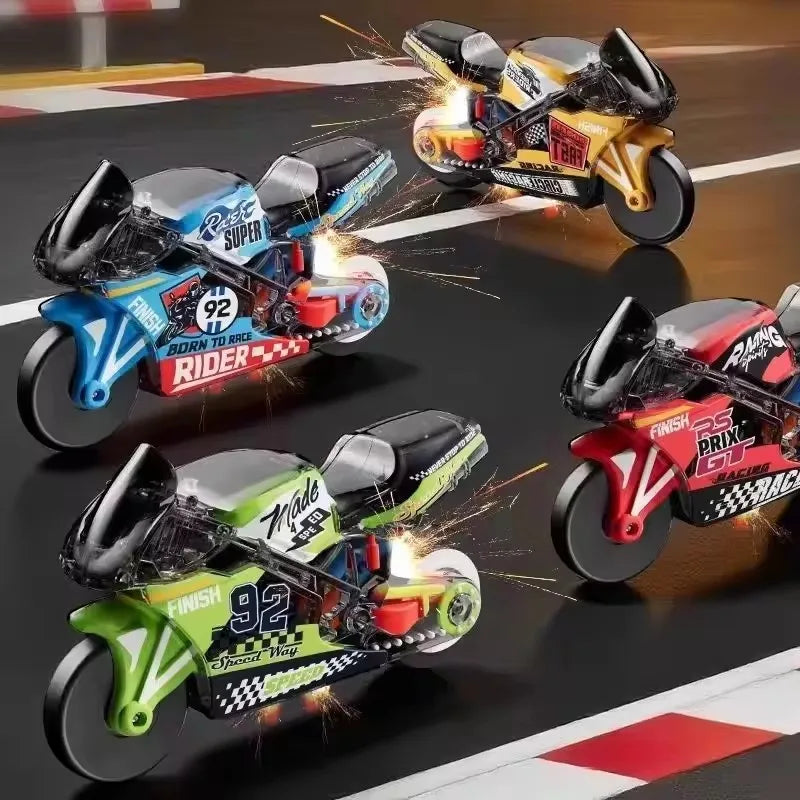 A collection of five die-cast motorcycle keychains in various colors and finishes performing an inertia action on a dark surf