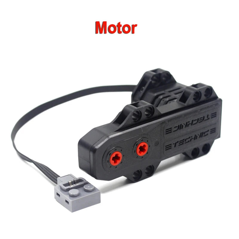A black motor set with wires and a battery connector is shown against a white background.
