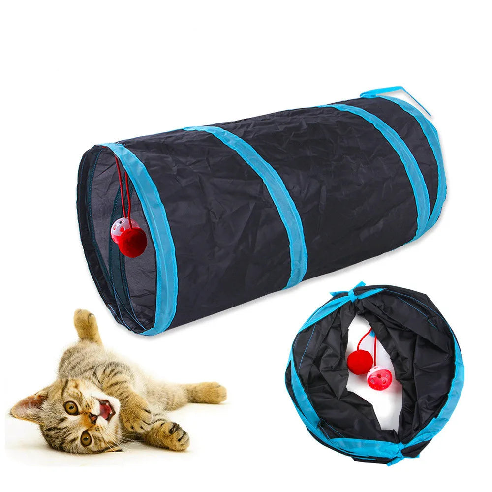 Black foldable S-shaped cat tunnel with blue trim and hanging red ball toys
