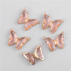 Gold-toned crystal butterfly charm beads used for jewelry making