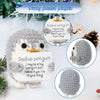 Handmade crochet penguin doll with a positive message card featuring the text I may be a tiny penguin but I believe in you go