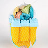 A set of beach castle sand play accessories including a bucket and scoop in yellow and blue colors.
