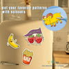 Sticker pack featuring a lion, strawberry, and french fries on a light colored surface.