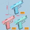 Three pistol water guns in blue, pink, and green are shown against a light background.