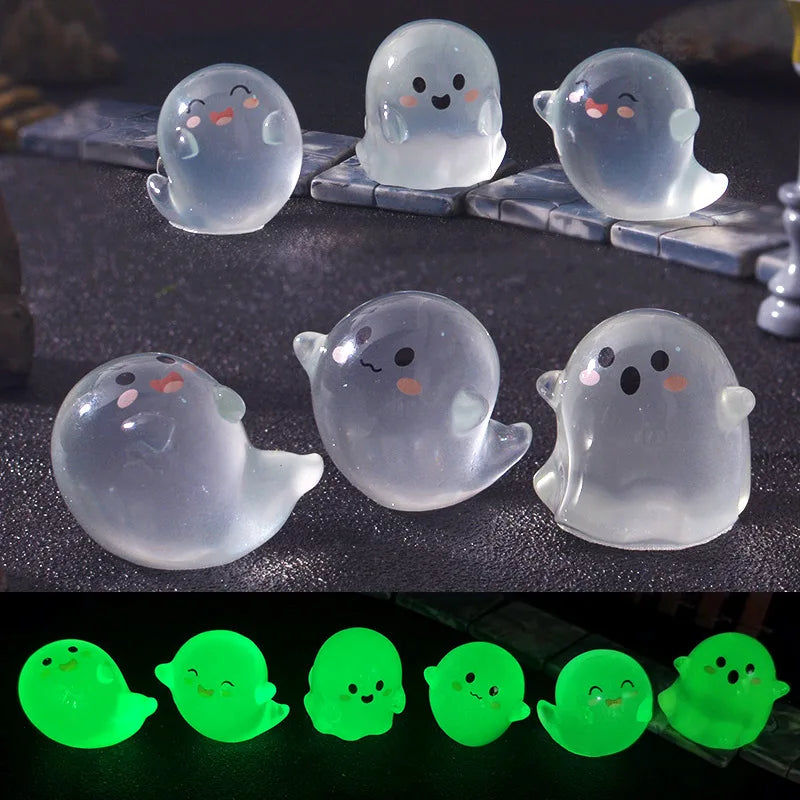 Colección de adornos de calabaza fantasma bruja luminosos en colores transparente y verde.