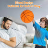 A boy is holding an orange basketball while a man rests in bed, demonstrating the silent design of the foam ball.