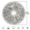 A circular plate of gold and silver plated beads for jewelry making with various shapes like round, star, heart, and square.