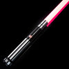A black lightsaber with a bright pink blade is shown diagonally against a black background.
