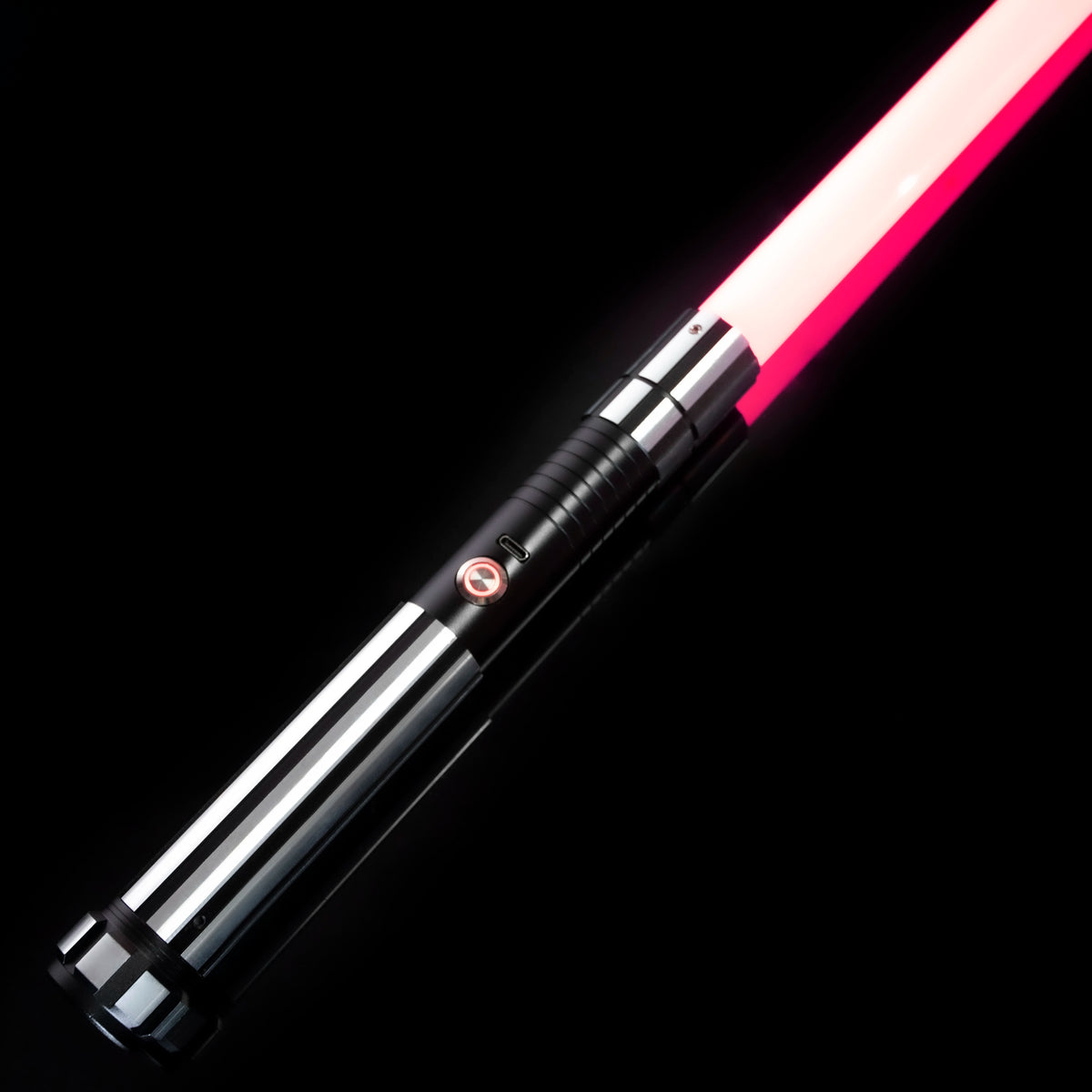 A black lightsaber with a bright pink blade is shown diagonally against a black background.