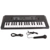 A black 37-key portable electric keyboard piano with a microphone and cables.