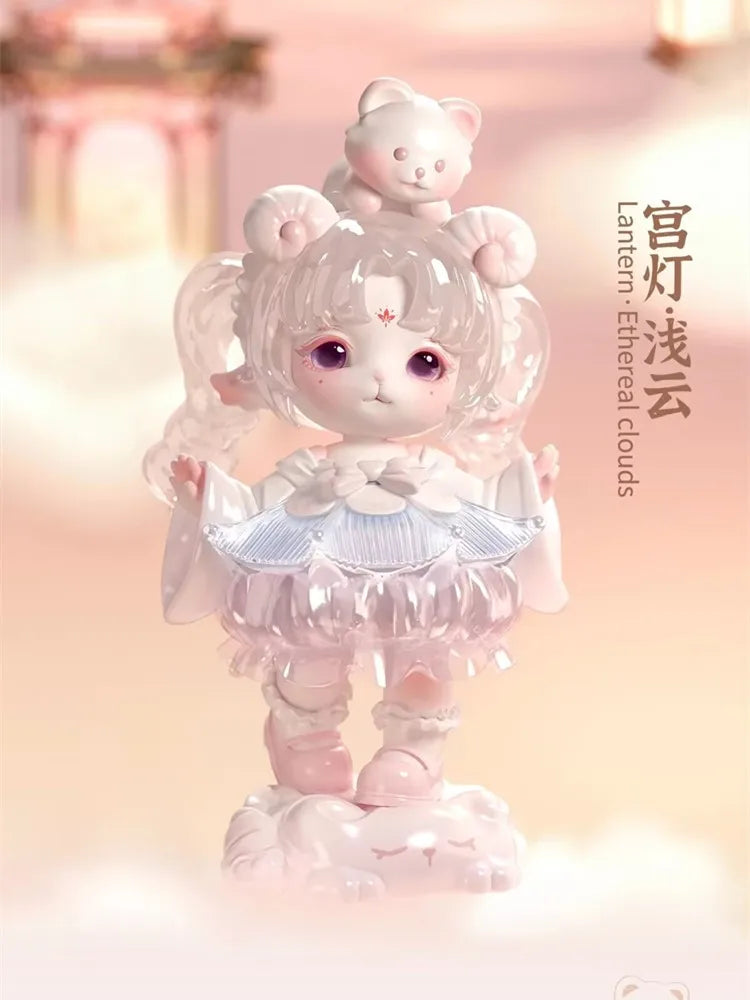 A cute, light pink collectible figurine of a girl with white hair and pink clothing, sitting on a cloud.