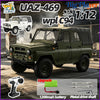 A dark olive green WPL-469 1:12 scale RC rock crawler truck is shown outdoors.