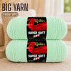 Two skeins of bright mint green super soft red acrylic yarn for knitting and crochet projects