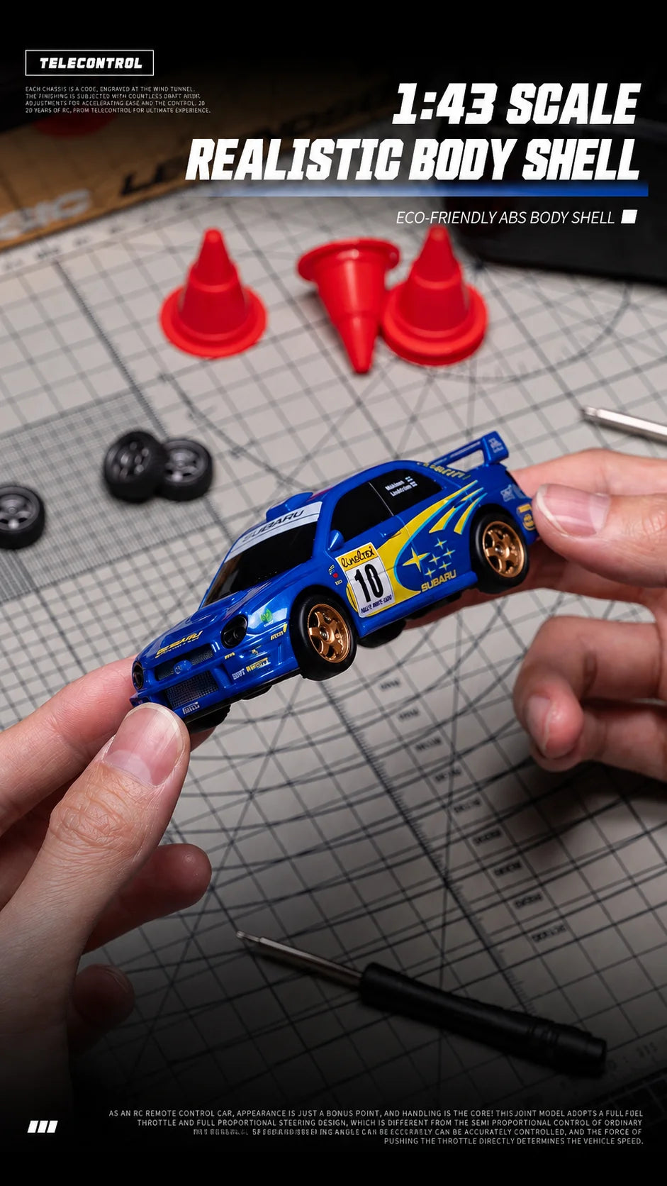 A blue 1:43 scale RC drift car is held above a graph paper, showcasing its realistic body shell and features.