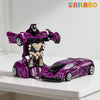A purple transformable robot sports car toy with an armored chest piece and wheels displayed on a white surface.