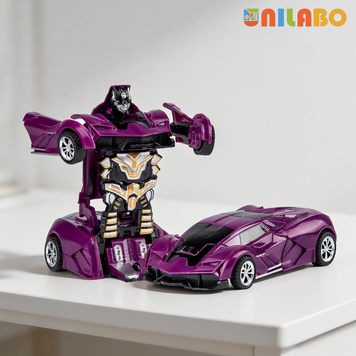 A purple transformable robot sports car toy with an armored chest piece and wheels displayed on a white surface.