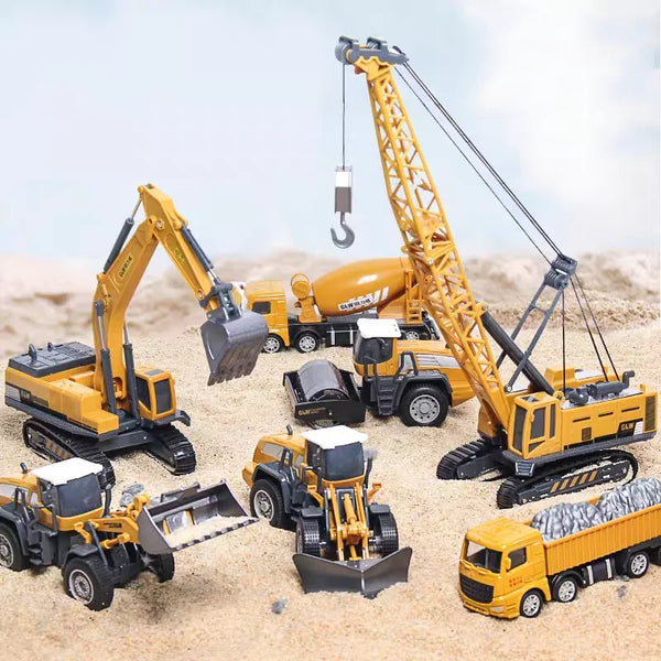 A set of four yellow construction vehicles, including an excavator and dump truck, made of diecast metal toys.