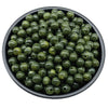 A bowl filled with small, round, olive green acrylic beads for jewelry making.