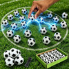 A hand places a soccer ball onto a green surface surrounded by glowing blue electrical arcs, with other balls scattered aroun
