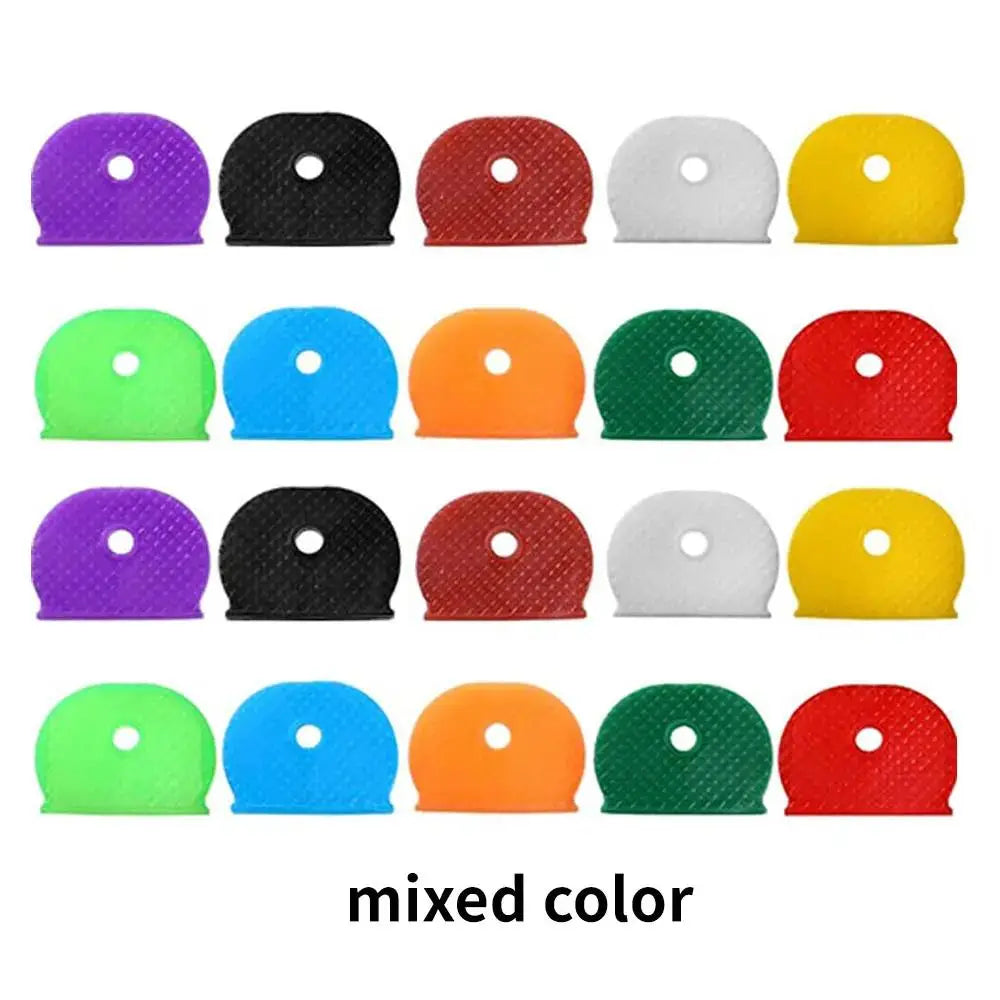 A collection of colorful soft silicone key sleeves in various colors including purple, black, red, white, yellow, green, and 