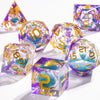 A collection of handmade liquid core polyhedral dice in purple and blue with a galaxy finish