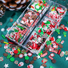 A collection of festive Christmas polymer clay slices in red, green, and white patterns scattered on a teal surface.