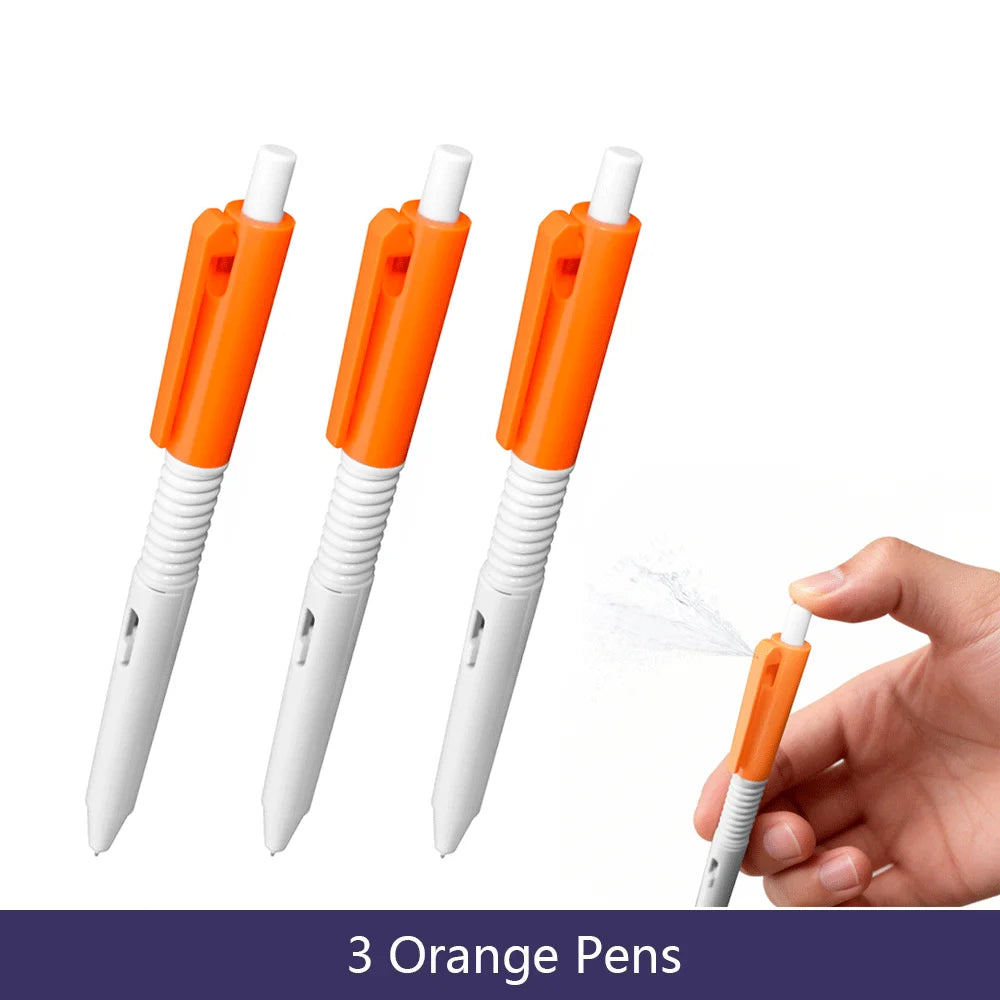 Three orange squirt water spray pens shown against a white background.